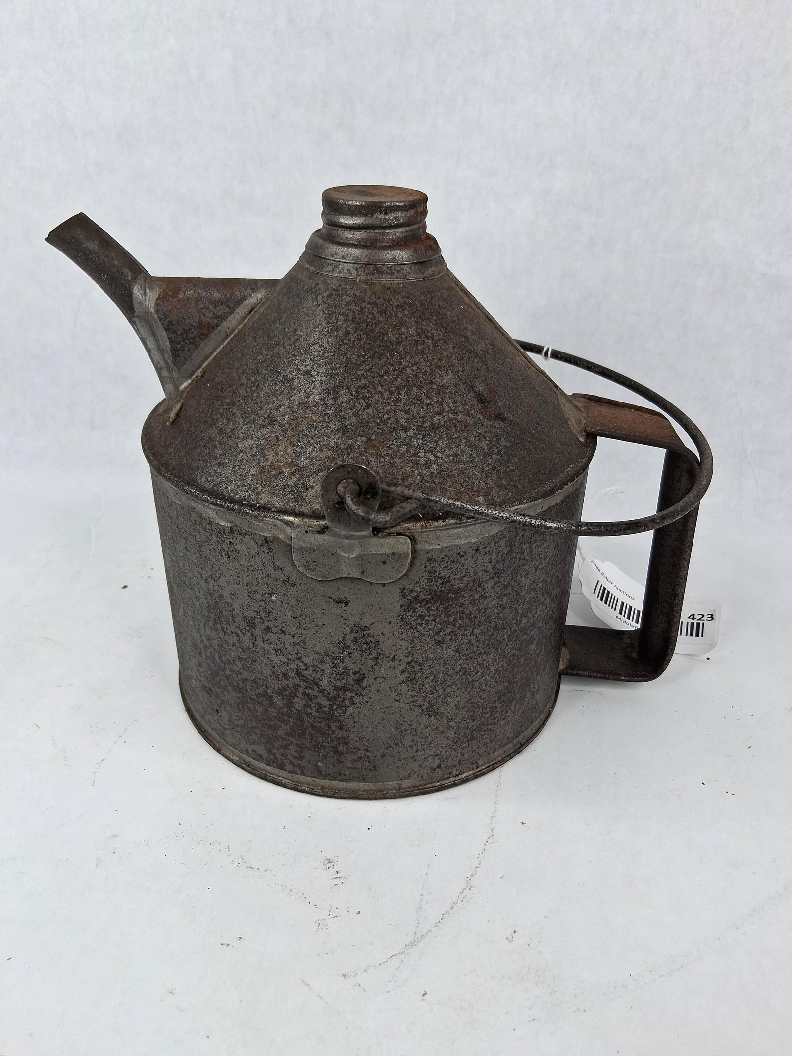 P. Wall Co. Industrial Oil Filler Can: This is a heavy-duty industrial oil filler can manufactured by the P. Wall Manufacturing Supply Co. of Pittsburgh, Pennsylvania. The vessel is constructed of heavy-gauge steel and features a cylindric