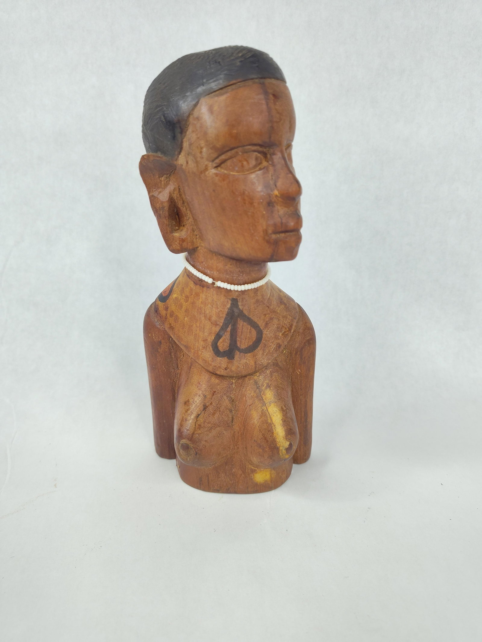 Vtg African Hardwood Female Bust w/: A hand-carved wooden bust representing a stylized female figure, characteristic of 20th-century African trade art. The figure is carved from a single block of reddish-brown hardwood with a polished