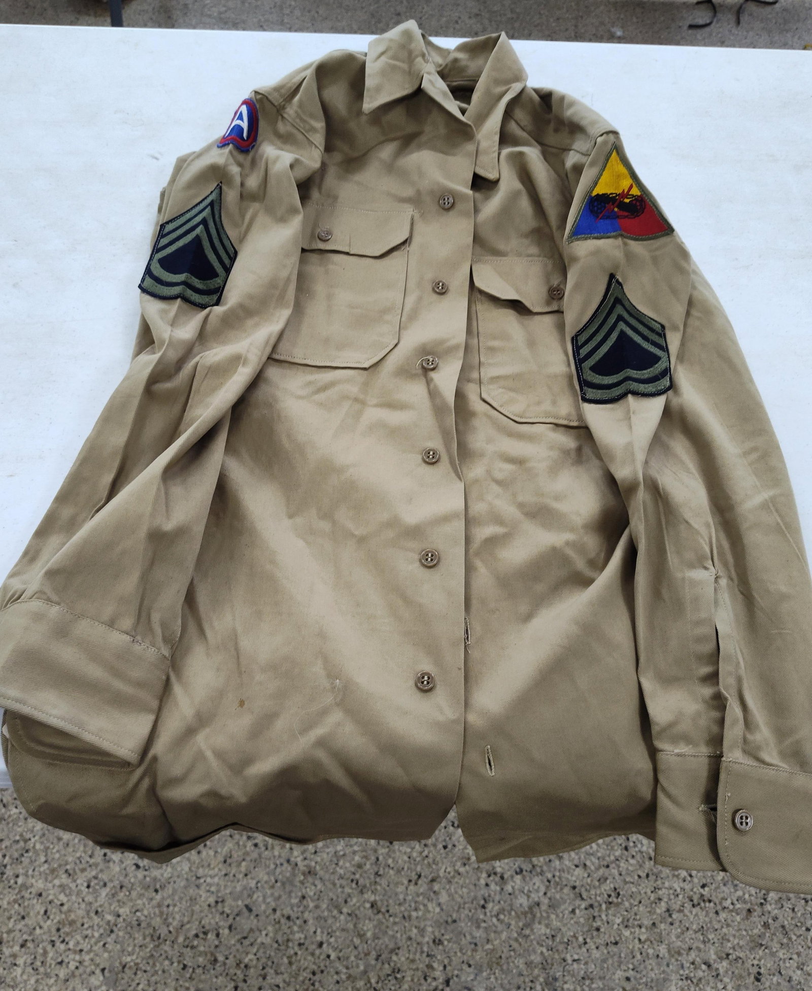WWII US Army 3rd Army & Armored Shirt: This is a World War II era United States Army khaki cotton twill service shirt, commonly known as a Chino shirt. The garment is constructed from tan cotton twill and features a pointed collar, two