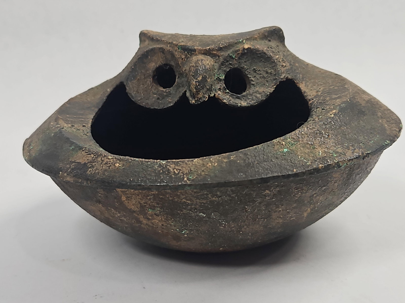 Cast Copper Alloy Owl Incense Burner: A two-piece decorative vessel cast from a copper-based alloy featuring a stylized animalier owl motif. The lid section is designed with a wide, down-turned rim and is surmounted by an owl head