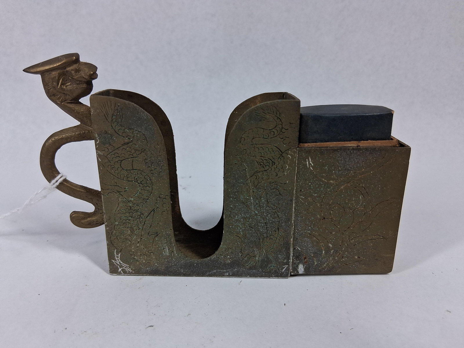 Chinese Export Brass Dragon Desk Set: A Chinese export brass desk accessory featuring a cast decorative handle. The piece is built from brass plate and contains three storage areas, including a central U-shaped compartment, a small
