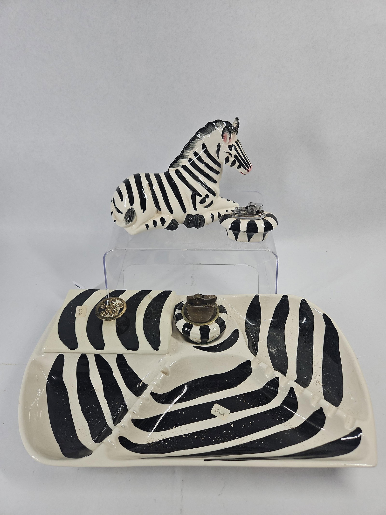 Hand Painted Ceramic Zebra Smokers Set: A vintage five-piece ceramic smoker's set featuring a bold hand-painted zebra stripe pattern. The collection consists of a large multi-compartment tray, a reclining zebra figurine, and two table