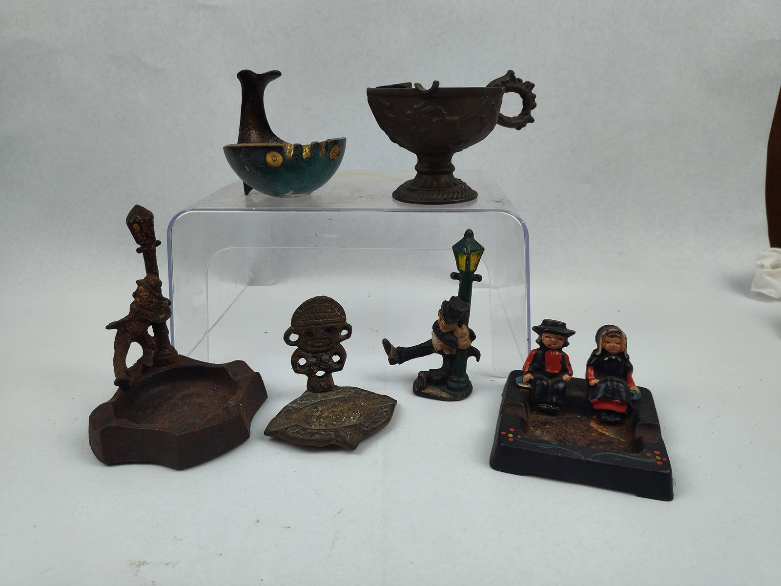 D. Oppenheim Metal Ashtrays & Figurines: An Israeli handmade bronze-toned ashtray in the form of a whale features a verdigris exterior finish and a hammered gold-tone interior, with the underbelly bearing a rectangular impressed mark