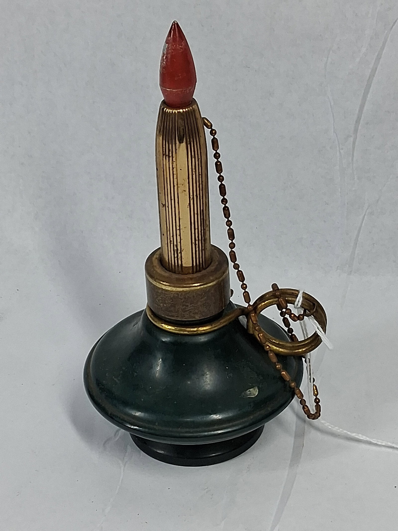Candle Form Table Lighter, Green Stone: A mid-century vintage table lighter designed in the form of a candle, featuring a dark green polished stone base and gold-toned metal hardware. The central fluted metal stem is topped with a removable
