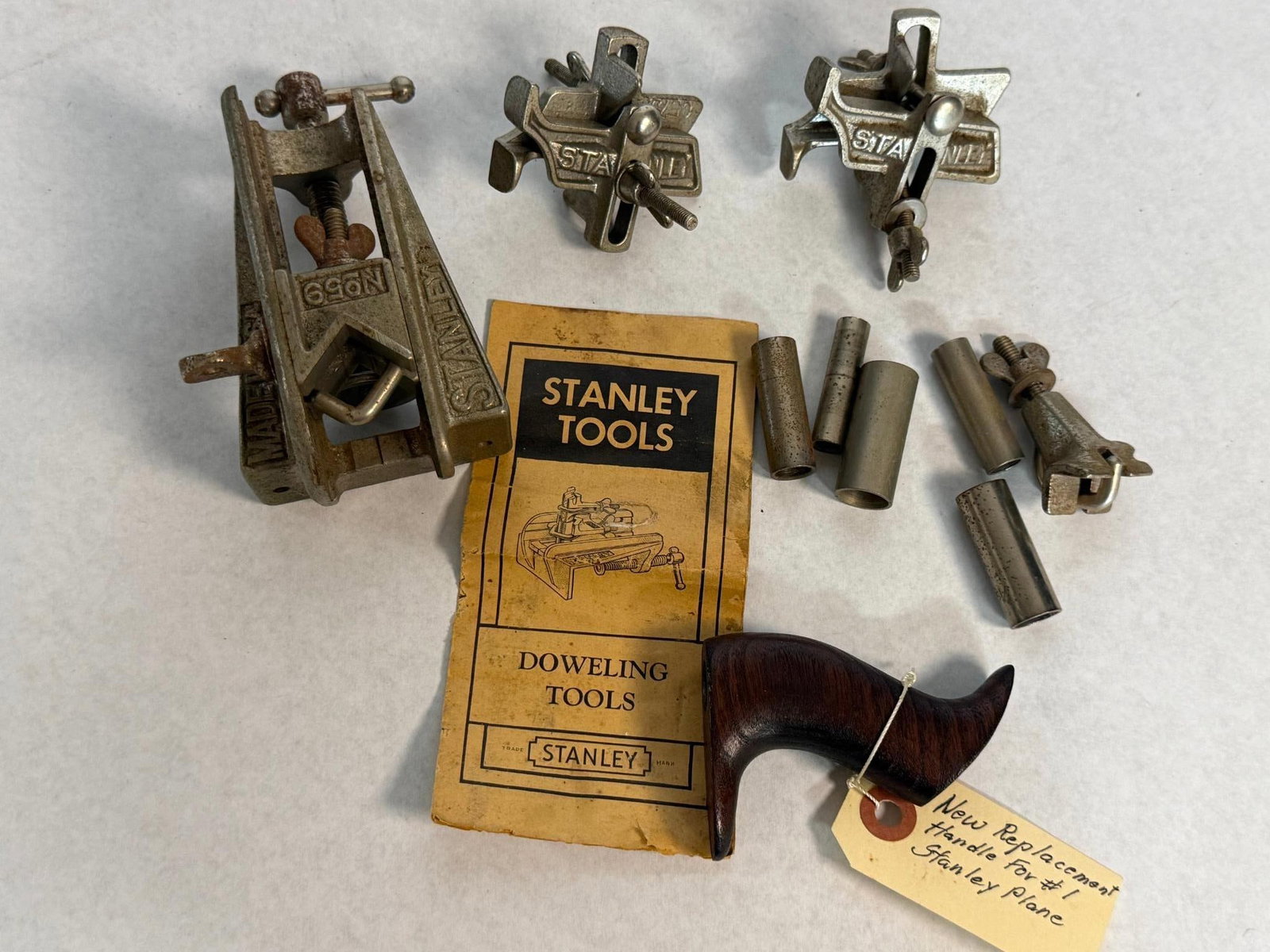 Stanley Tools, No. 59 Jig & Plane Tote: This collection of woodworking tools and accessories features a Stanley No. The body of the jig is marked with the impressed name STANLEY, the model No 59, and vertically oriented characters reading