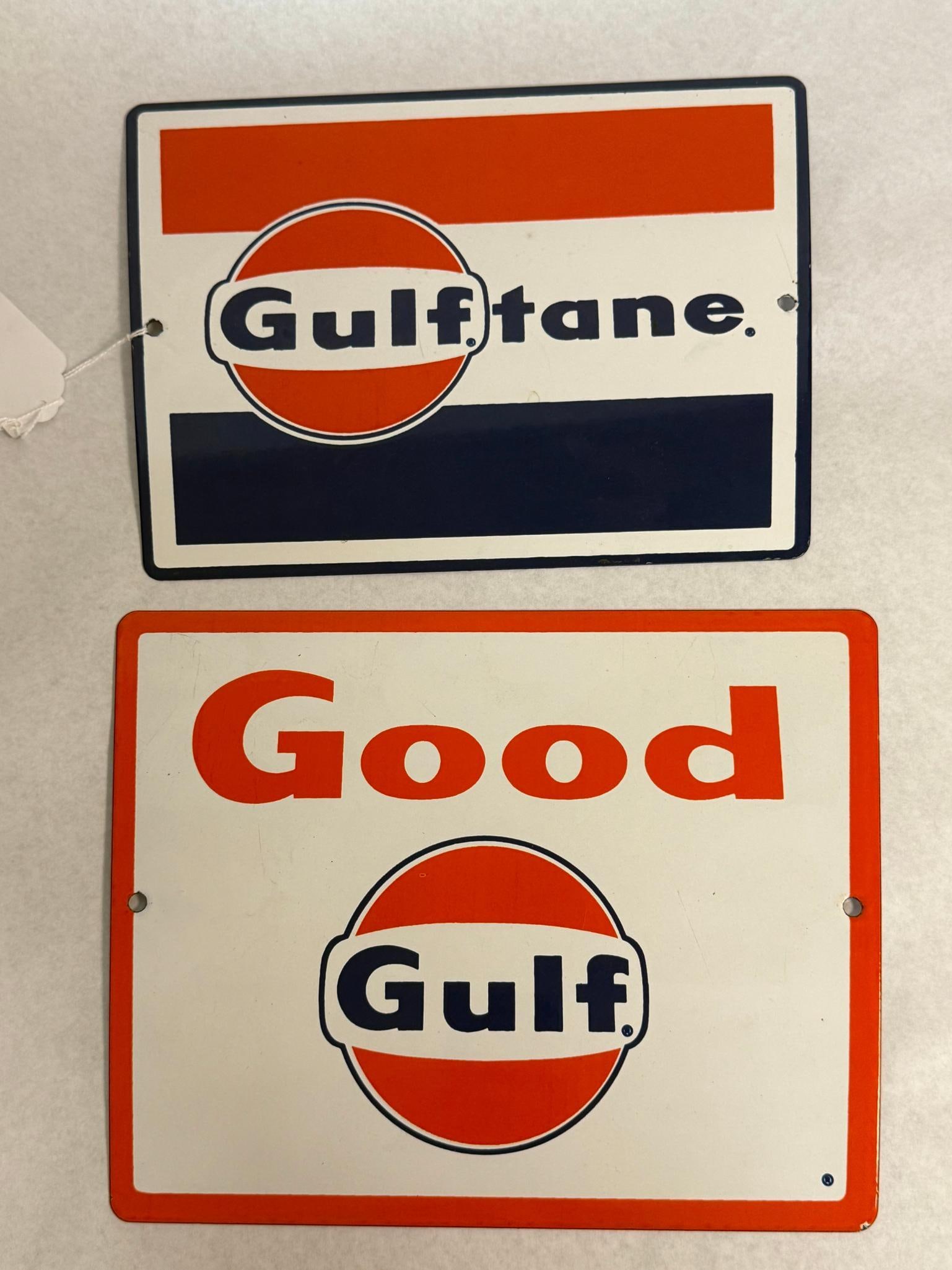 Pair Gulf Oil Porc. Gas Pump Plates: This is a pair of porcelain enamel gas pump signs produced for the Gulf Oil Corporation. The first plate features the navy blue word Gulf within a white band inside an orange circular logo, with the