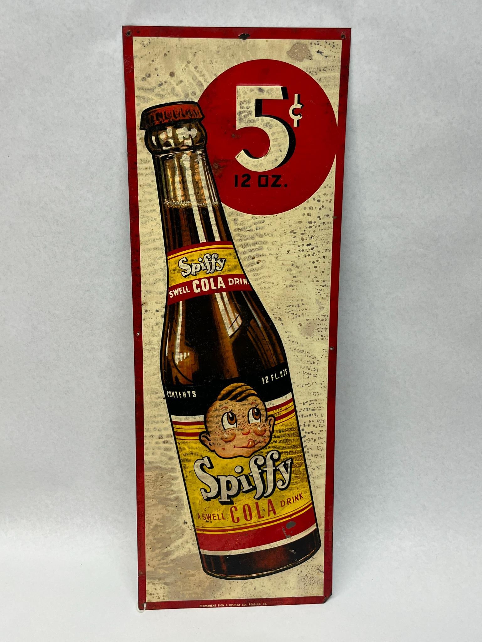 Spiffy Cola Tin Sign, Permanent Sign Co: A mid-century vertical tin lithograph advertising sign for the regional soft drink brand Spiffy Cola. The graphic design features a large red circular graphic in the upper right containing white and