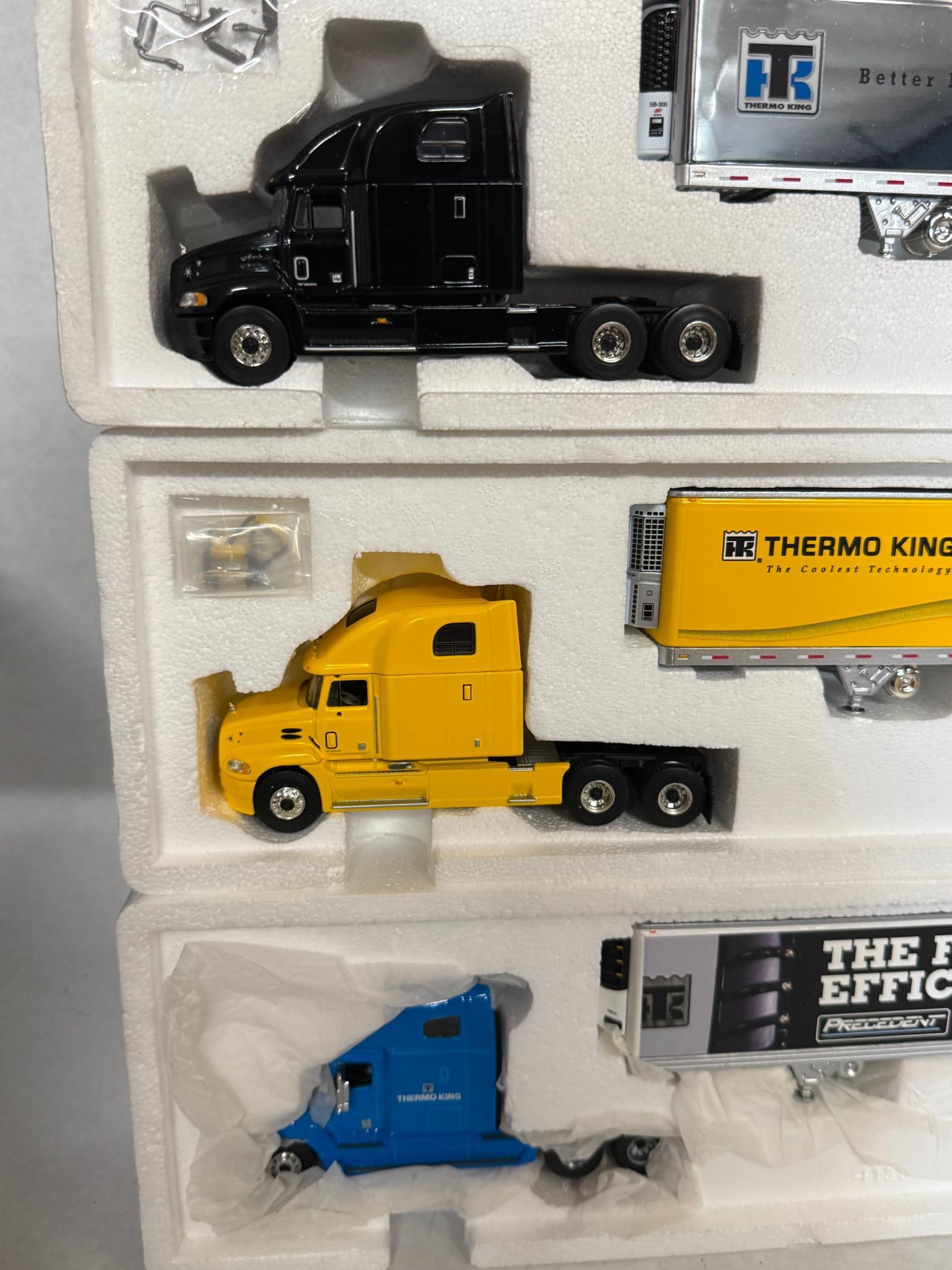 3 Mack Vision Die-Cast Tractor-Trailers - 2
