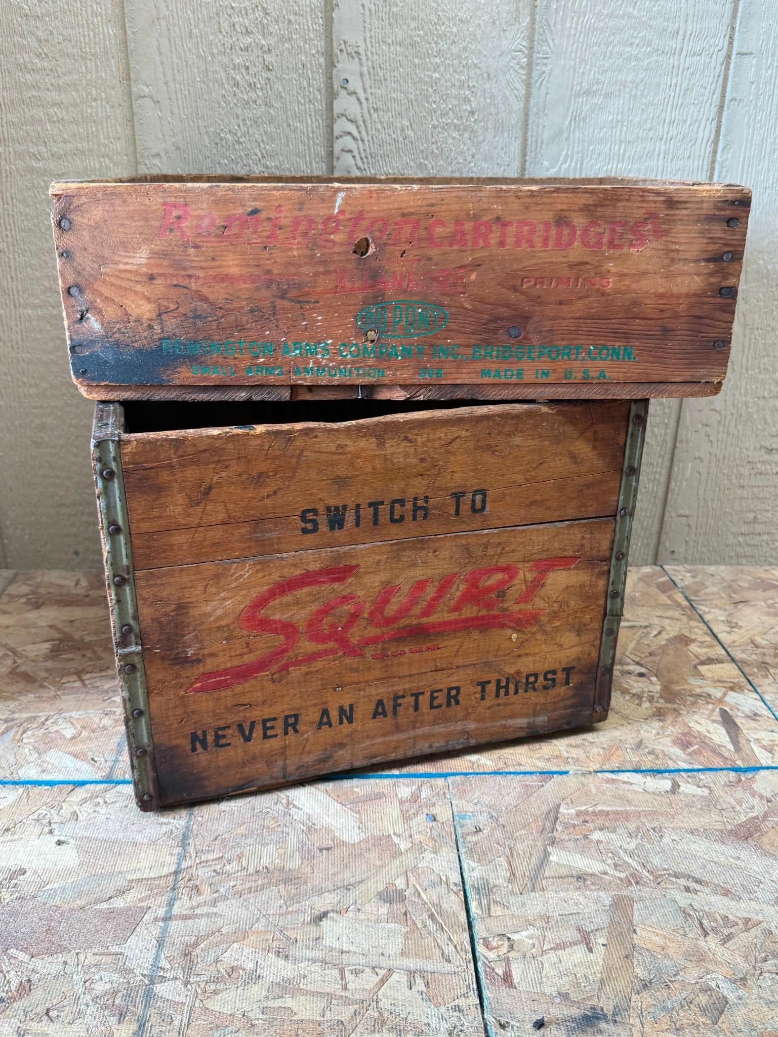 Two Remington & Squirt Soda Wood Crates: This lot features two distinct wooden advertising crates of American manufacture. The first item is a wooden ammunition shipping crate constructed from softwood with nailed joinery. One side panel