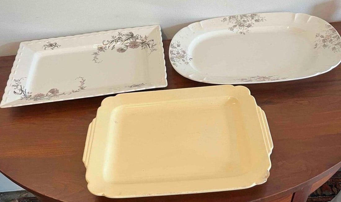 3 Ceramic Serving Platters, Floral/Deco: Three ceramic serving platters of various forms and decoration styles. The first is a rectangular earthenware platter with a molded, scalloped pie-crust rim and asymmetrical transfer-printed floral