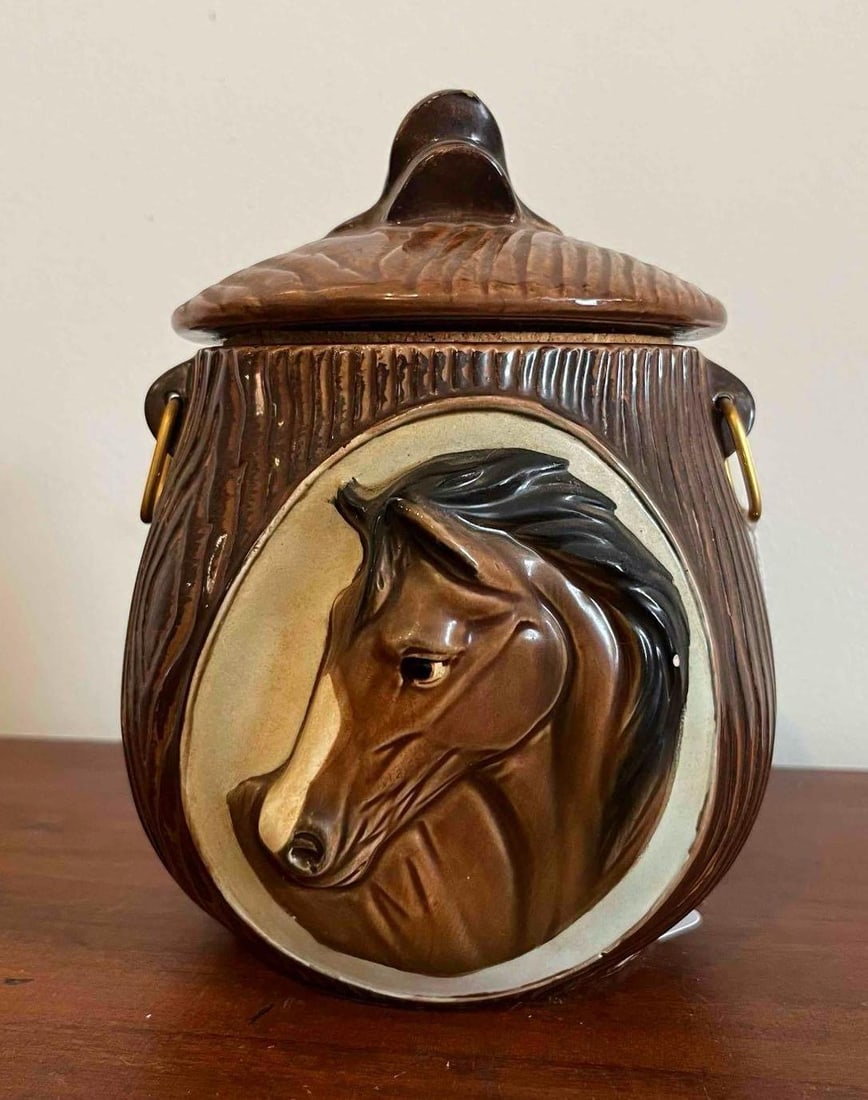 Earthenware Faux Bois Horse Humidor: A glazed earthenware jar featuring a barrel-like form with a deeply incised faux bois or wood-grain texture. The exterior is finished in a dark brown glaze, while the front is decorated with a
