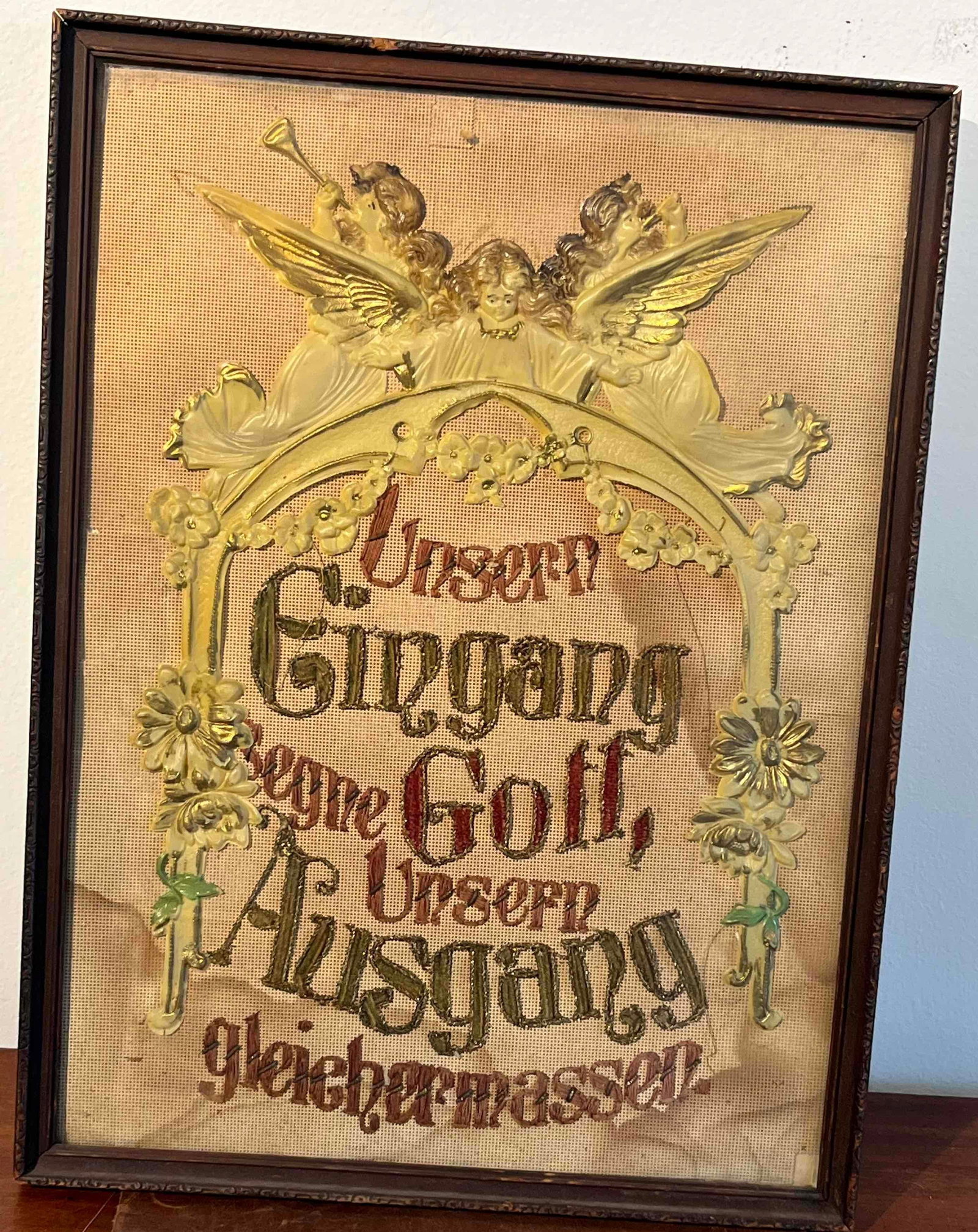 Late 19th C. German House Blessing Emb: A mixed-media religious needlework piece, identified as a traditional German house blessing or Haussegen, executed on a perforated paper support. The central hand-embroidered text reads Unsern