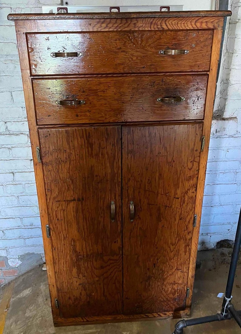 Hand Tools & Wood Workshop Tool Cabinet: This lot consists of a tall one-piece wooden storage cabinet and an assortment of hand tools. The cabinet features plywood and solid wood construction with a prominent rotary-cut grain finished in a