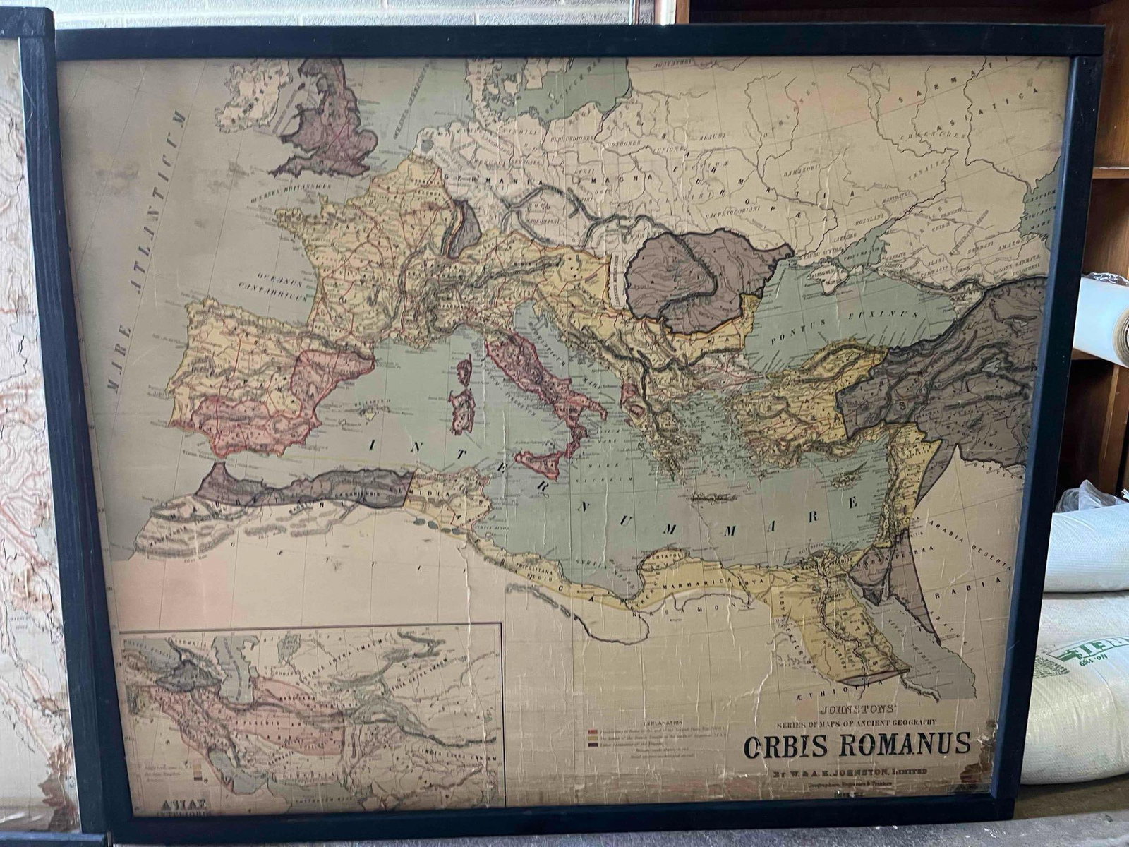 W. & A. K. Johnston Pair Ancient Maps: A pair of color lithographs on paper serving as institutional wall maps, published by W. & A. K. Johnston, Limited of Edinburgh. The first map is titled ORBIS ROMANUS and depicts the extent of the