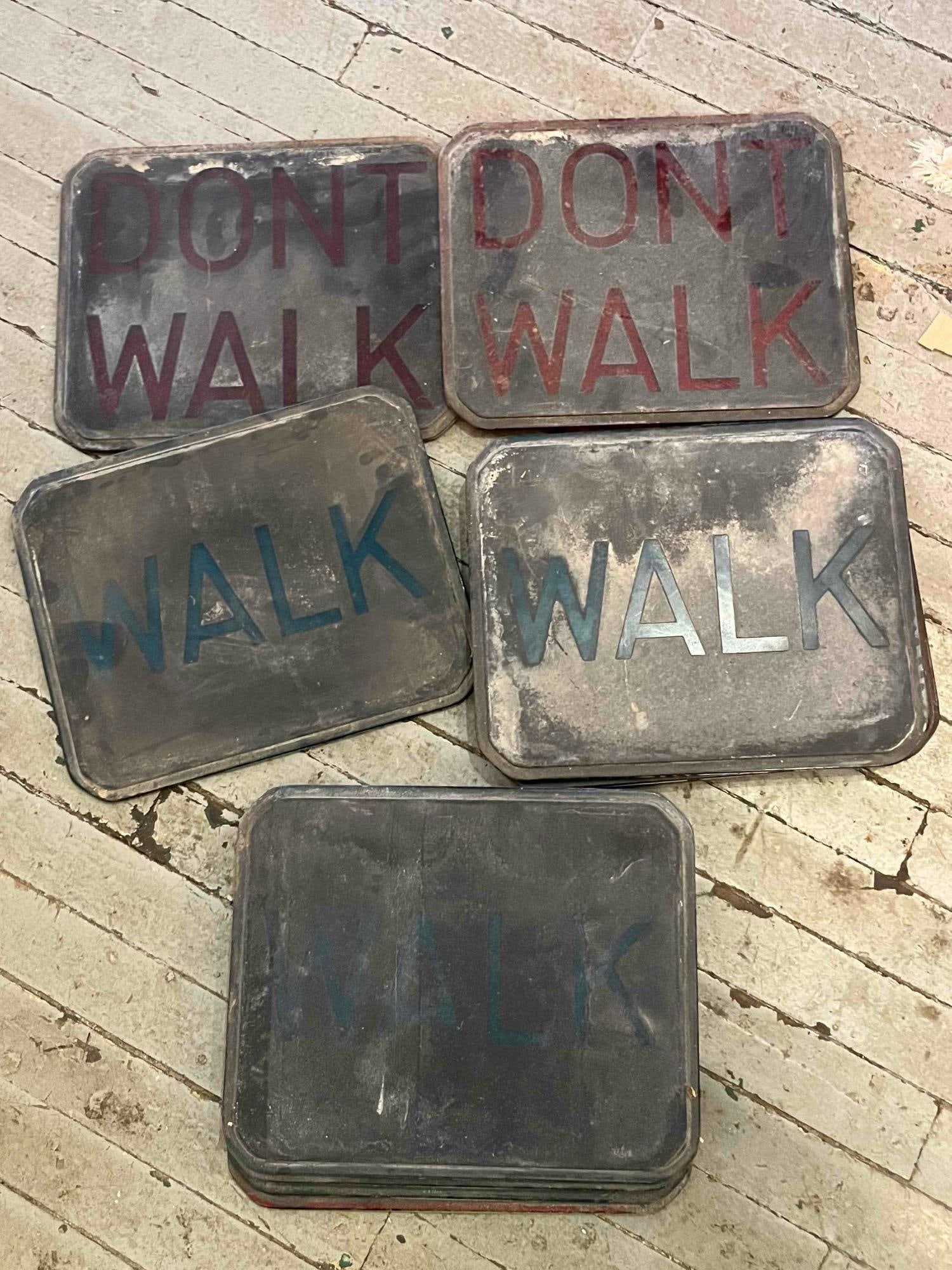 8 Pedestrian Traffic Signal Lenses: A collection of eight pedestrian crosswalk traffic signal lenses. This assortment includes two lenses featuring the text DONT WALK in red characters arranged on two lines, and six lenses featuring