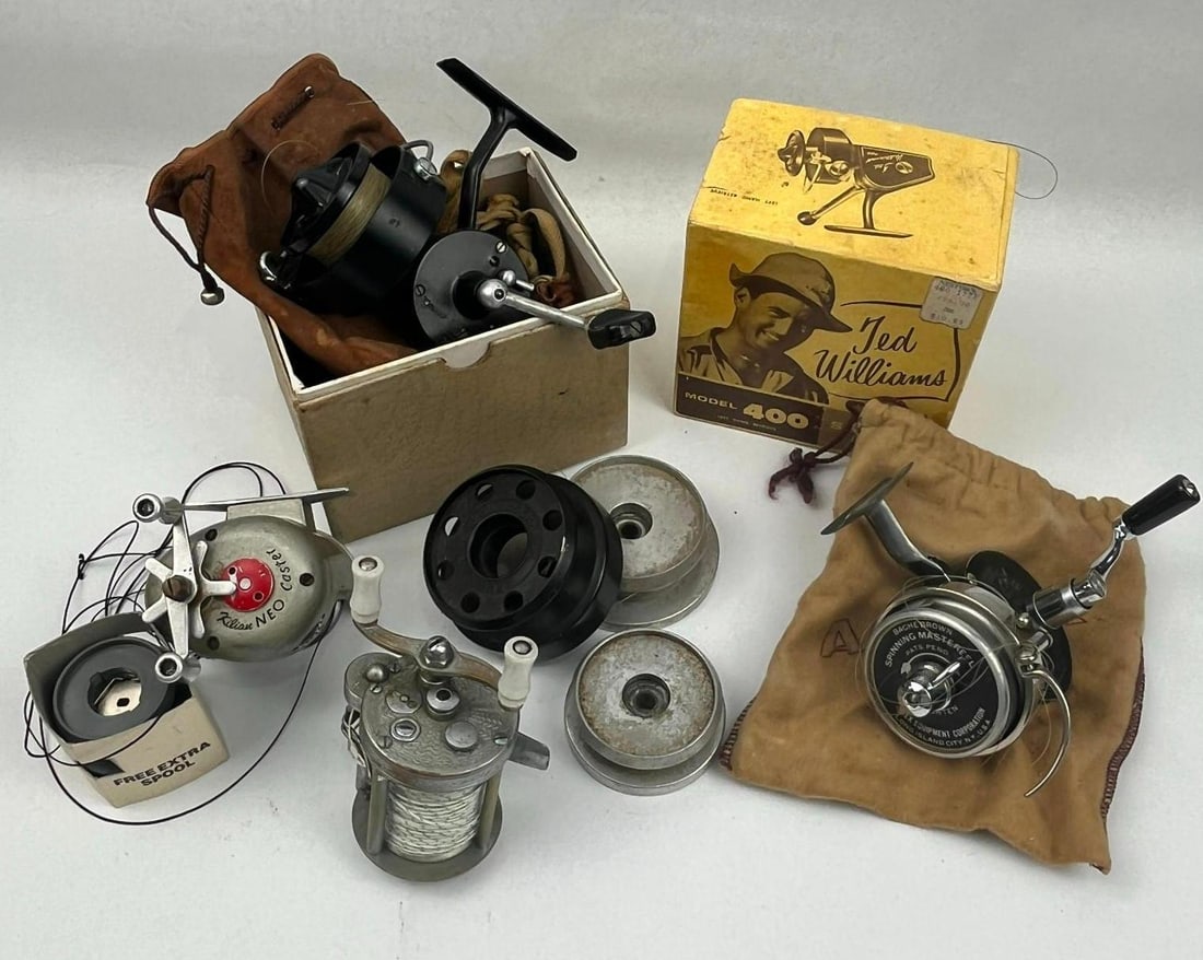 Garcia Mitchell & Fishing Reels: An assortment of mid-20th-century fishing reels and accessories, including spinning, baitcasting, and hybrid models. The collection features several notable manufacturers with readable maker names and