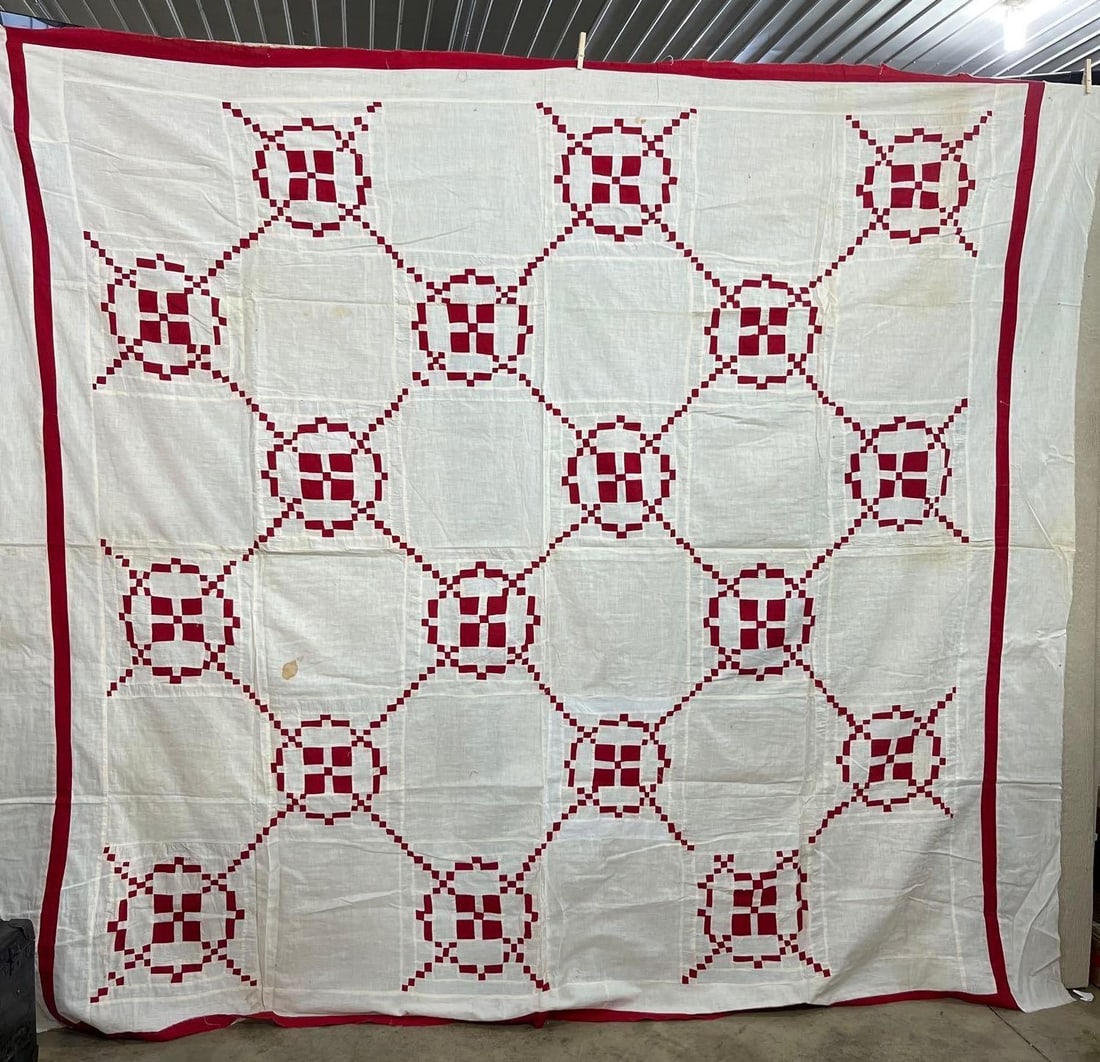 Burgoyne Surrounded Cotton Quilt Top: A pieced cotton quilt top featuring the Burgoyne Surrounded pattern in a high-contrast red and white color scheme. The design consists of sixteen primary blocks arranged in a four-by-four grid. No