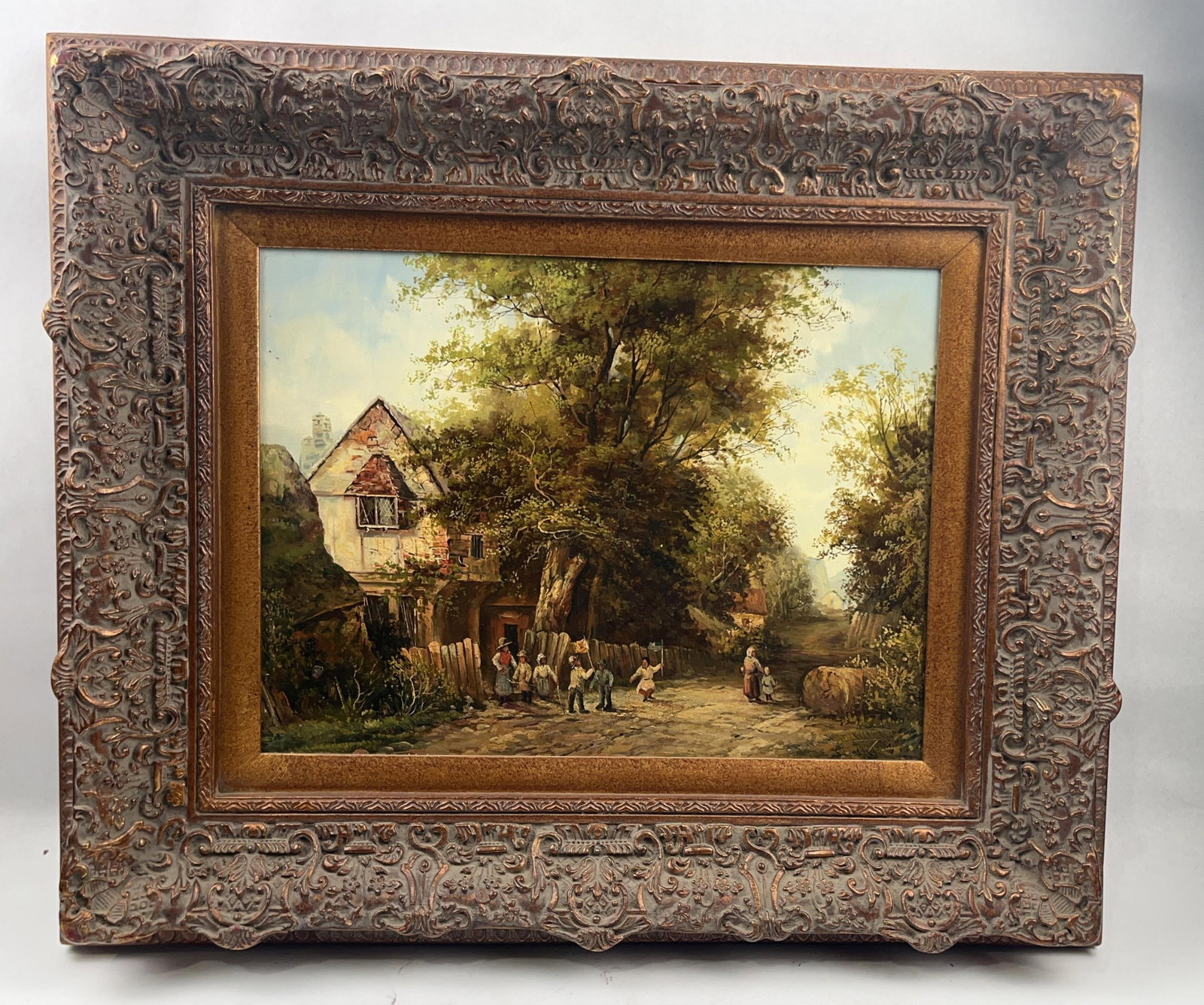 J. Thors Village Landscape Oil on Board: This nineteenth-century oil on board painting depicts a pastoral village scene featuring a group of children playing with flags on a dirt lane. The painting is signed in dark paint in the lower right 