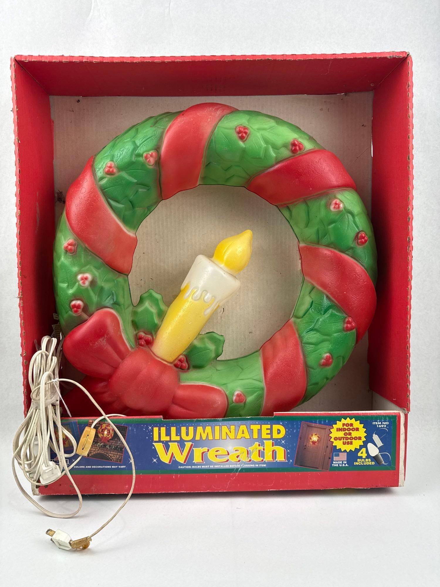 Empire Blow-Mold Christmas Wreath w/Box: An American-made blow-mold plastic Christmas wreath manufactured by Empire. The wreath is composed of textured green plastic molded into holly leaves with red berries, wrapped with a red ribbon and