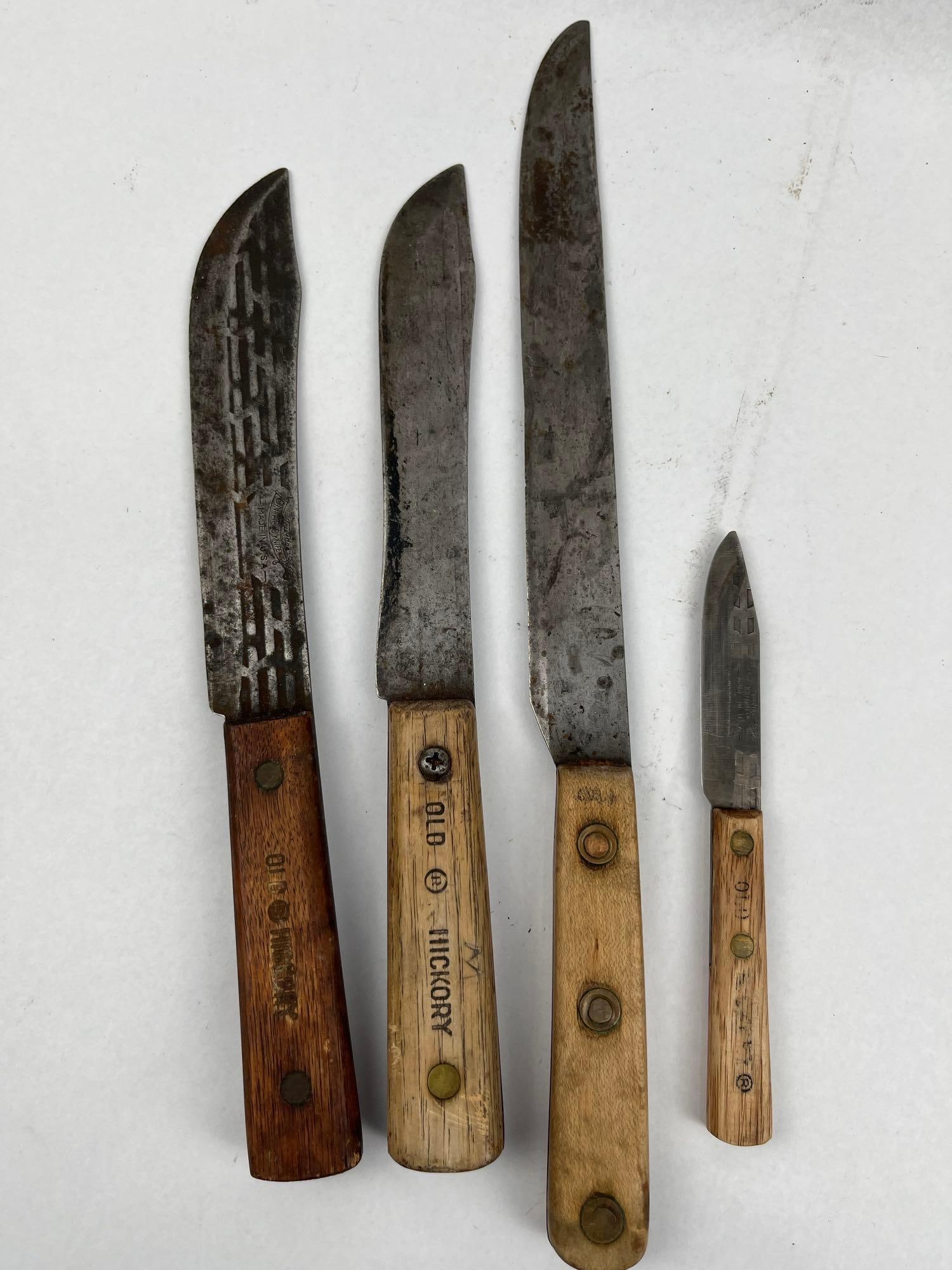 Old Hickory Carbon Steel Kitchen Knives: This collection features kitchen knives constructed with high-carbon steel blades and full-tang wood handles. The assortment includes various blade profiles such as butcher, slicing, and paring styles