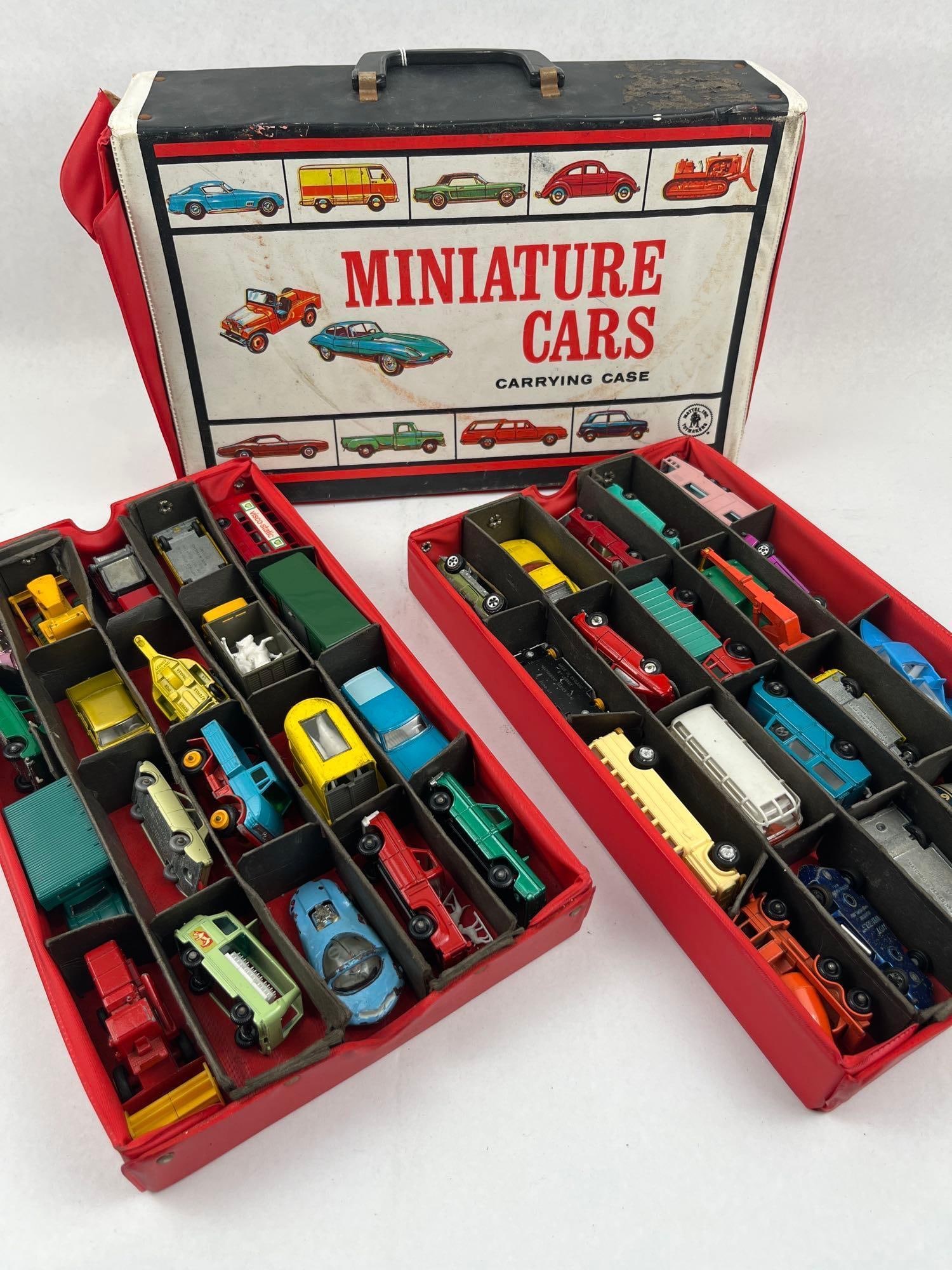 Mattel Die-Cast Vehicles & Case: A collection of vintage die-cast toy vehicles housed in a red and white vinyl-covered carrying case. The case front features the printed text MINIATURE CARS CARRYING CASE and a circular Mattel logo.