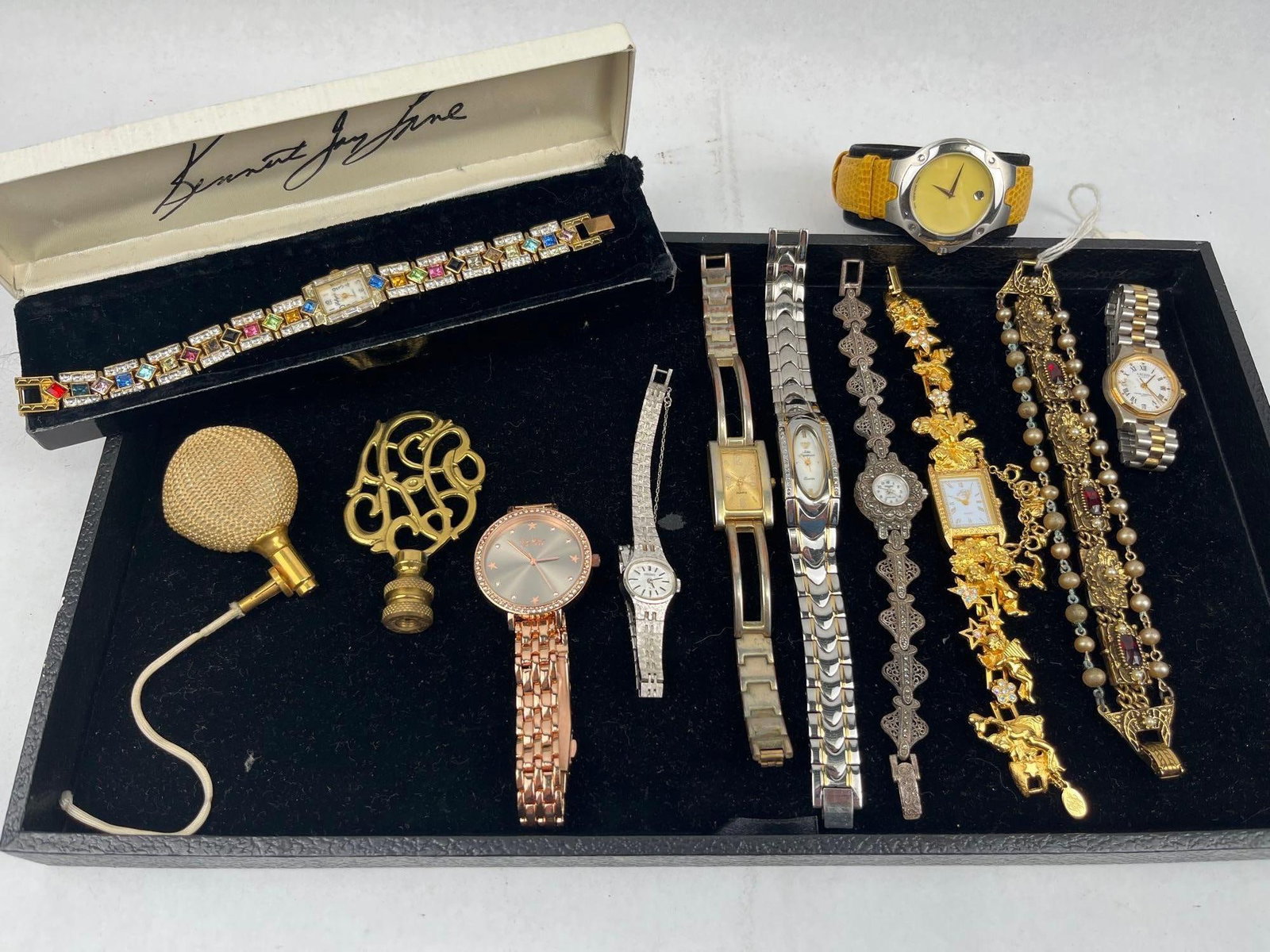 Movado, Kirks Folly & Gruen Str. Lot: A group of ladies wristwatches and accessories comprising various styles and materials. Included is a Movado Museum-style wristwatch featuring a plain yellow dial marked SWISS MOVADO MADE with a singl