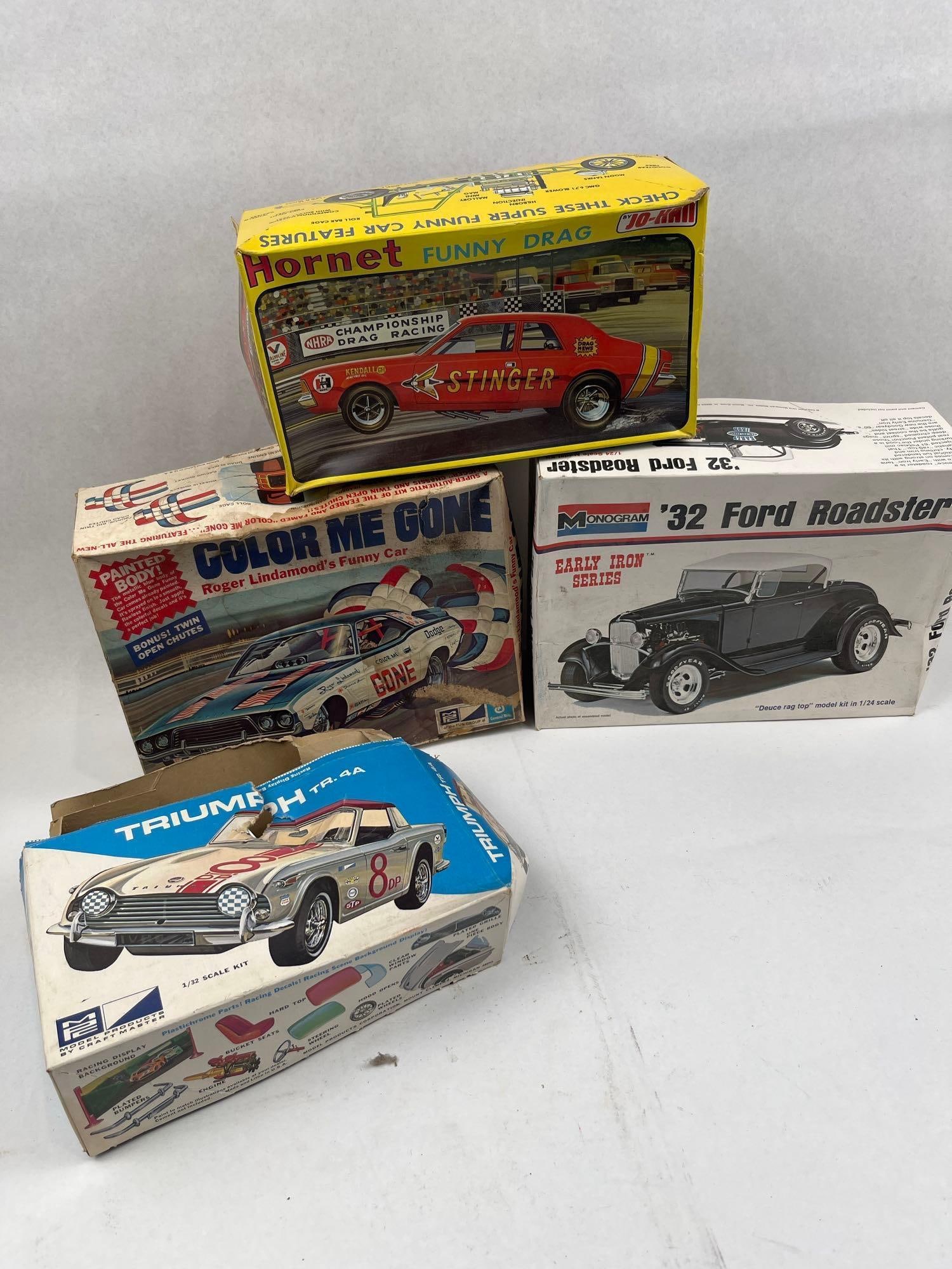 Jo-Han, Monogram & MPC Model Kits: A group of vintage plastic model vehicle kits and related components primarily dating from the late 1960s to early 1970s. The collection features a Jo-Han Models, Inc. Hornet Funny Drag kit, model num