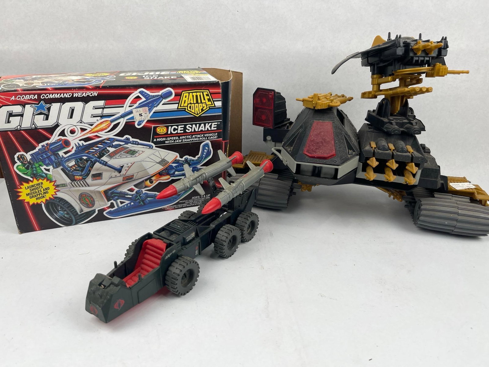 3 Hasbro G.I. Joe & Cobra Vehicles: A trio of Hasbro molded plastic toy vehicles from the G.I. Joe: A Real American Hero line, produced between 1987 and 1992. The collection includes a 1992 Battle Corps Ice Snake arctic attack vehicle,