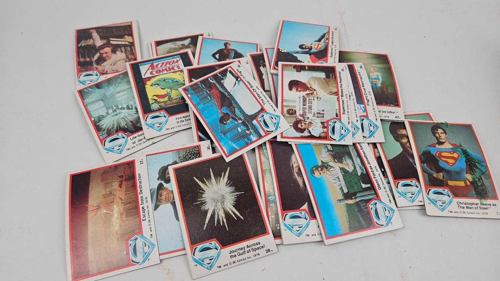 1978 Superman Movie Trading Cards: A group of trading cards issued in 1978 to commemorate the motion picture *Superman*. The cards are constructed from printed cardstock and feature various photographic stills and illustrations