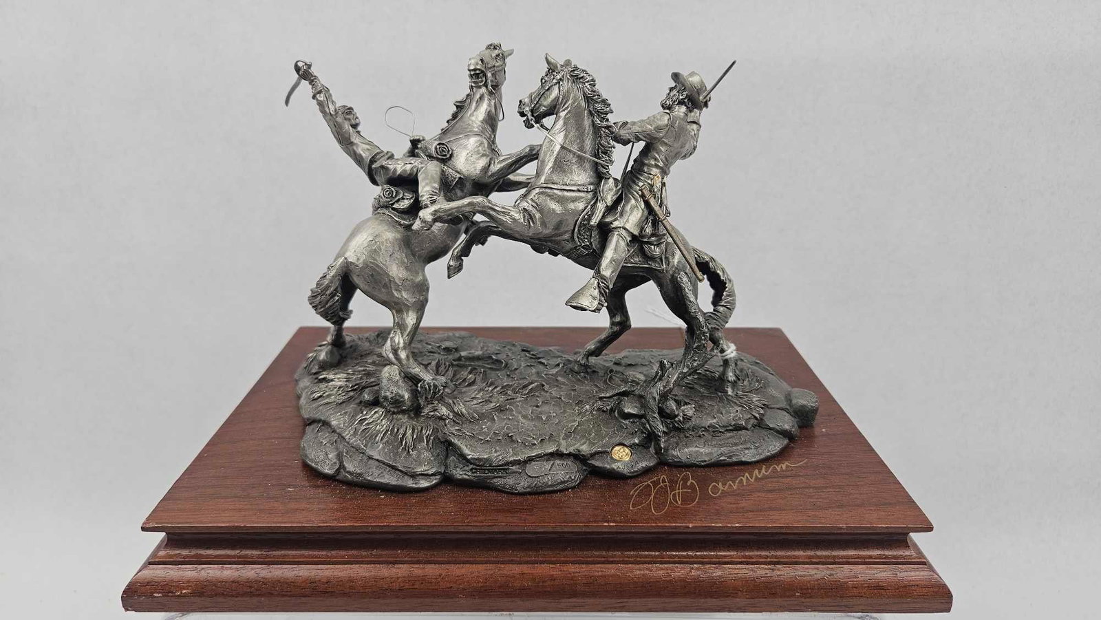 Barnum Chilmark Clashing Sabers Pewter: This limited edition fine pewter sculpture titled Clashing Sabers is by artist Francis J. Barnum for Chilmark. Produced in 1995, the dynamic work depicts a Union and Confederate cavalryman engaged in 