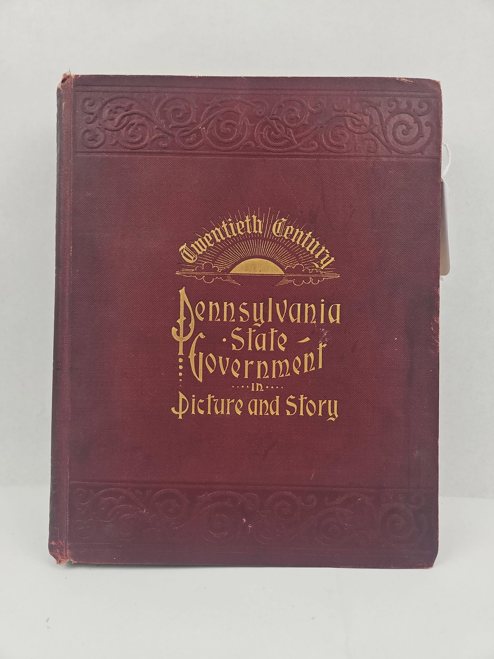 Wm. Rodearmel, PA State Government 1907: A maroon cloth-bound hardcover volume titled Twentieth Century Pennsylvania State Government in Picture and Story, compiled by Wm. Rodearmel. The front cover features gold-gilt stamped lettering and a