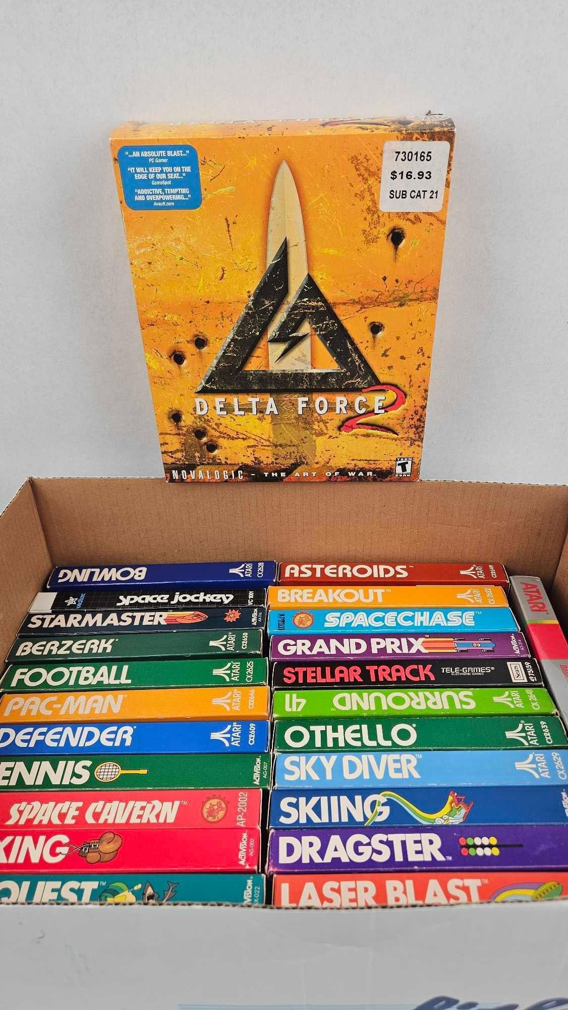 Atari 2600 & PC Boxed Video Games: This collection consists of an assortment of vintage boxed video games for the Atari 2600 console and a large-box PC game. The Atari 2600 titles are presented in their original cardboard packaging