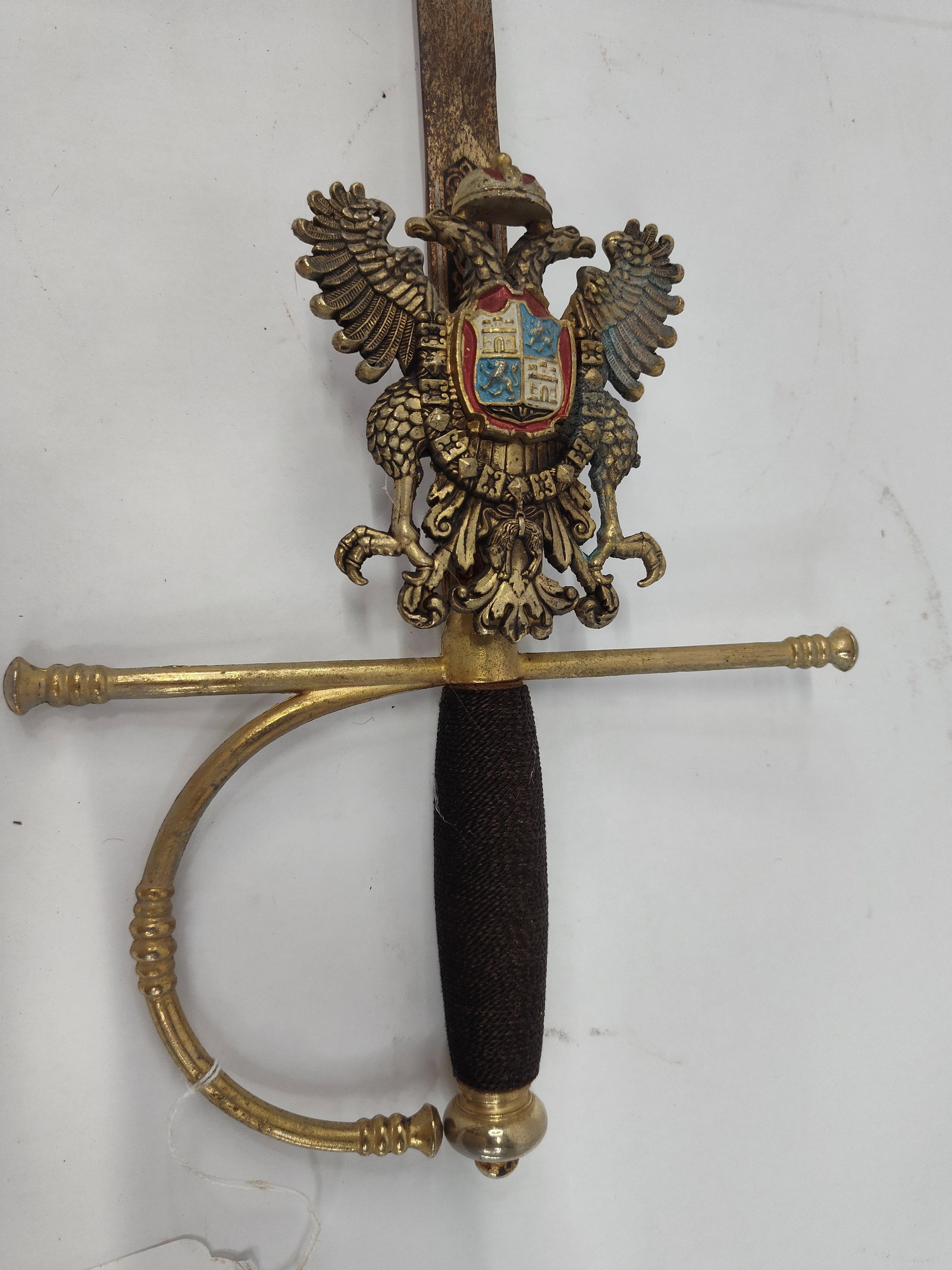 Toledo Heraldic Guard Dress Sword: A decorative Spanish smallsword or dress rapier featuring a gold-tone hilt and a slender steel blade. The hilt is constructed with a D-guard and a straight crossguard terminating in molded finials,