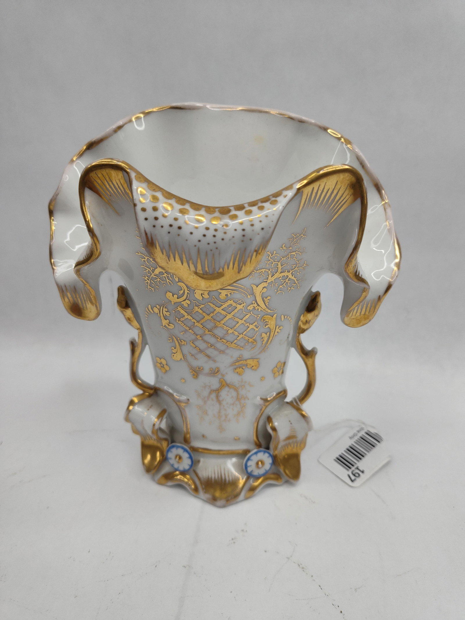 19th C. French Gilt Porc. Spill Vase: A nineteenth-century French porcelain spill vase, commonly referred to as Old Paris porcelain. The vessel features an ornate Rococo-revival form with a flared and scalloped rim, flanked by two scrolli