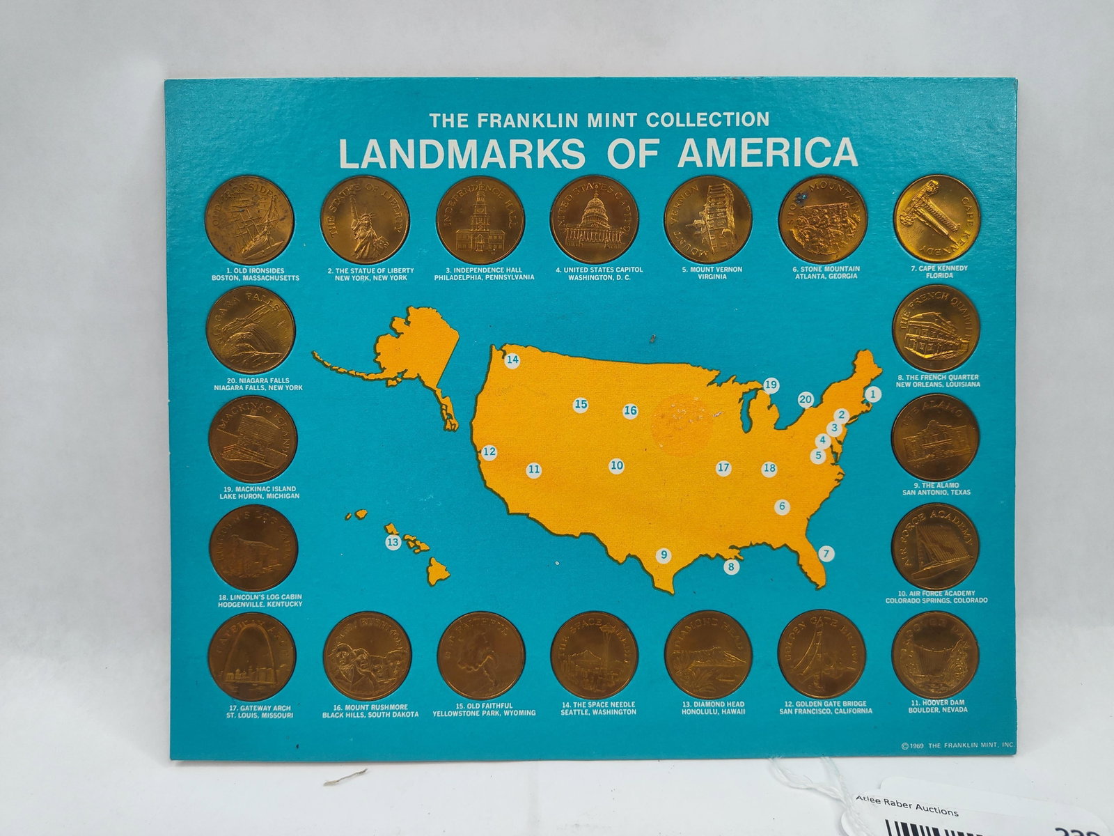 Franklin Mint Bronze Medals, 1969: A commemorative coin collection produced by The Franklin Mint titled Landmarks of America. The set consists of multiple bronze medals, each featuring a relief depiction of a significant United States