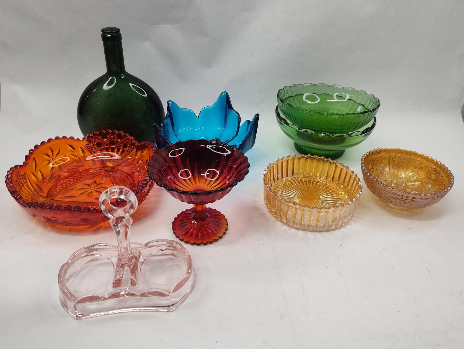 Glassware: Viking & E.O. Brody Set: This collection features a diverse assortment of American mid-century and decorative glass and tableware. A bright blue hand-formed glass bowl with an organic, flame-like rim features a clear