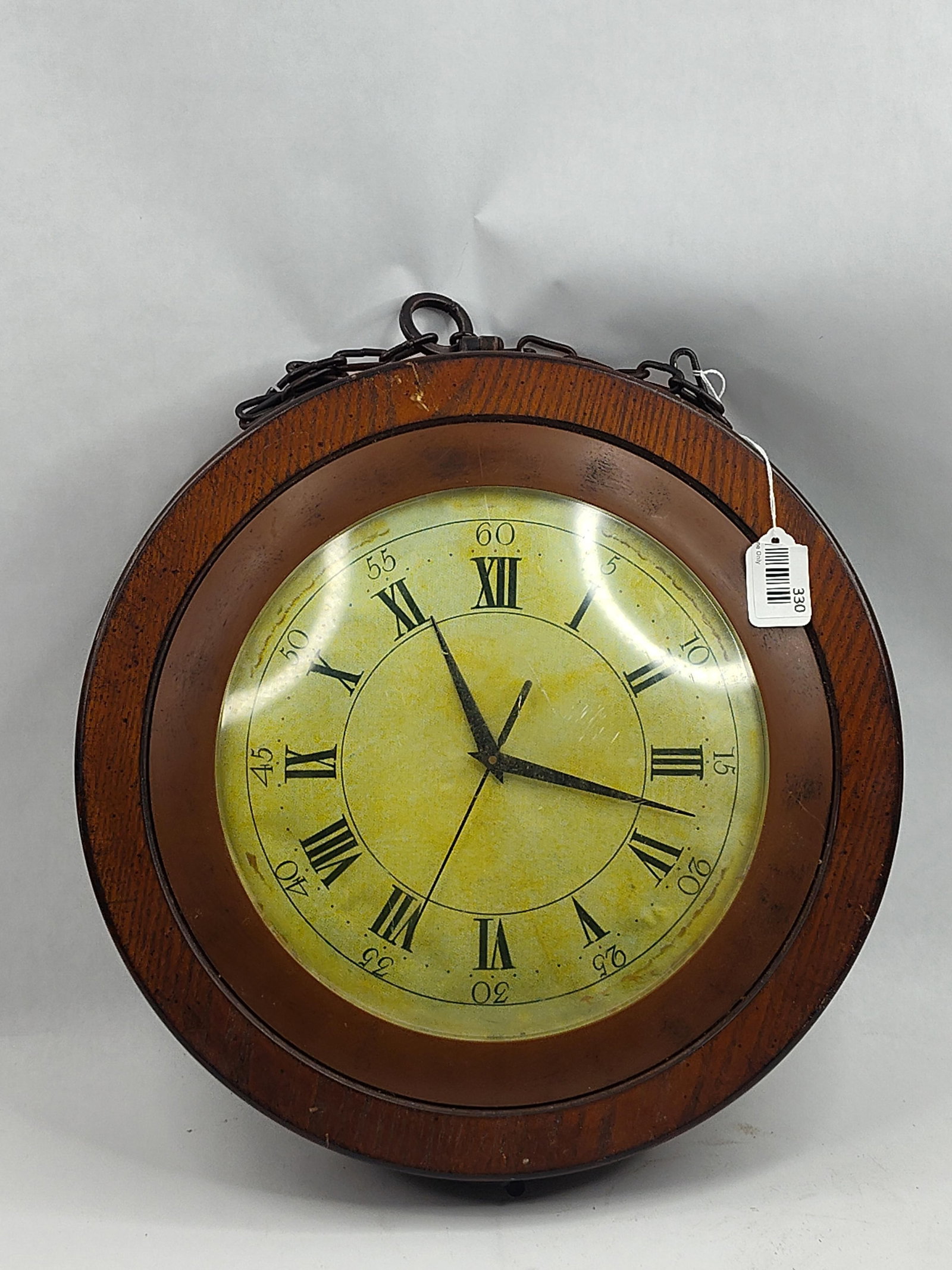 Double-Sided Wooden Pocket Watch Clock: A Chinese-made double-sided hanging wall clock featuring a circular wooden housing designed to emulate the form of a large pocket watch. The clock consists of two hinged wooden frames with a medium
