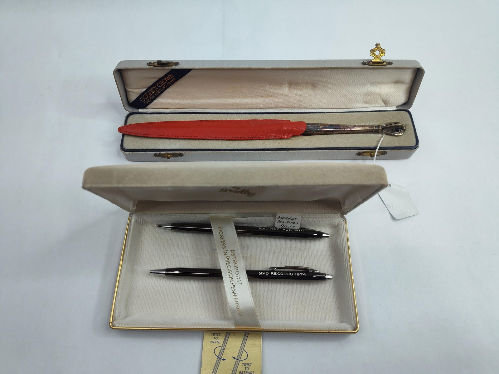 W. & S. Sorensen Str. Opener & Pen Set: This lot contains two separate desk accessories in their original presentation cases. The first item is a Danish sterling silver-handled letter opener. The handle features a tapered form with a
