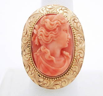 14K YELLOW GOLD HANDCARVED ANGELSKIN CORAL CAMEO RING: 14K YELLOW GOLD HANDCARVED ANGELSKIN CORAL CAMEO RING 14K YELLOW GOLD HANDCARVED ANGELSKIN CORAL CAMEO RING Stone: ANGELSKIN CORAL (23.3 mm x 16.1 mm) Size: 8.5" Weight: 13.2 g. Hallmark: 14K