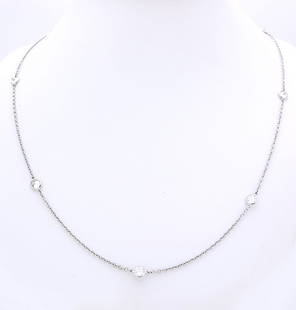 DIAMOND BY THE YARD 14K WHITE GOLD 18" NECKLACE: DIAMOND BY THE YARD 14K WHITE GOLD 18" NECKLACE DIAMOND BY THE YARD 14K WHITE GOLD NECKLACE Stones: Diamond apx. 2.08 TCW IF TO VS clarity and H color Length: 18: Weight: 4.2g. Hallmark: 750