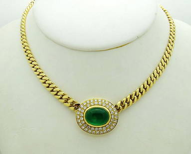 18K Gold Cabochon Emerald 1.56tcw Diamond Chain: 18K Gold Cabochon Emerald 1.56tcw Diamond Chain Necklace This necklace made of 14k yellow gold, has cabochon emerald stone 14.5mm x 11.5mm x 6.75mm and 52 diamonds. The pendant Measurements are 22.7mm