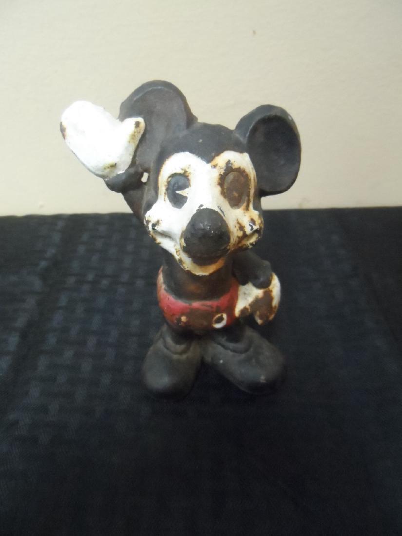 Cast Iron Fantasy Mickey Mouse Bank: Cast Iron fantasy Mickey Mouse bank. Has some rust but in good condition. Measures 6" tall