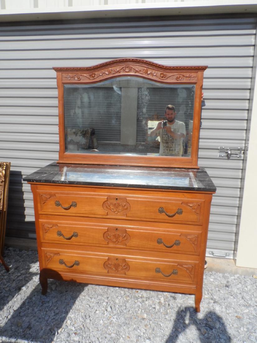 Antique English Marble Top Dresser and Mirror: Fully restored antique english black marble topped dresser and mirror. Drawers all machine cut dovetailed. Has a two matching twin beds, lot # #, and two matching black marble topped night stands, lot