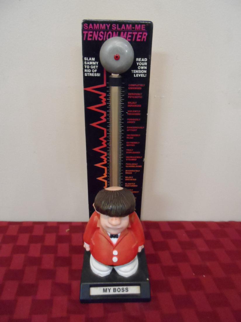 Sammy Slam-Me Tension Meter Toy: Sammy Slam-Me Tension Meter, My Boss made by Hyman Products, Inc. Relieve your stress by smashing the bosses head. The bead reader goes up to give you various readings from Invisibly Ruffled to Comple