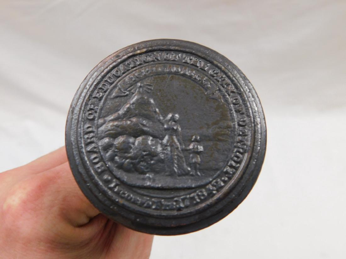 Antique City of Detroit Door Handle: Antique Board of Education City of Detroit Door Handle. Door handle depicts a woman holding a child's hand and pointing at the sun. Reads, "Board of Education of the City of Detroit", "Incorporated Fe