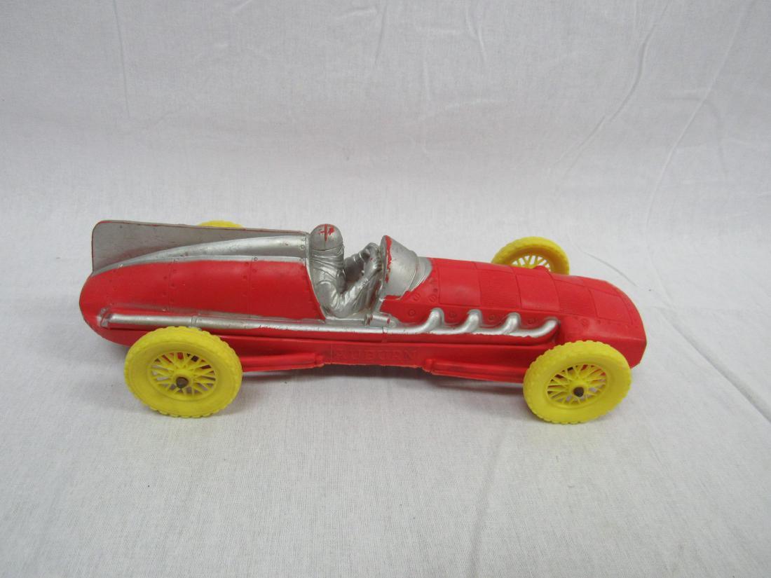 Vintage Auburn Rubber Company Race Car: Vintage Auburn Rubber Company Race Car. In overall excellent condition with original paint. 4 spokes have breaks in them. Measures 10.5" long
