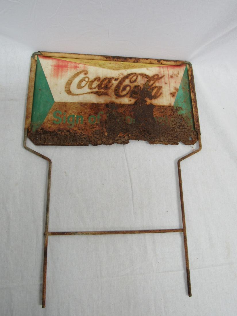 Coca-Cola Hand Truck Topper Sign: Double sided Coca-Cola Hand Truck Topper Sign with original stand. Dated around 1950s and in overall poor condition. Measures 16.5 x 10"