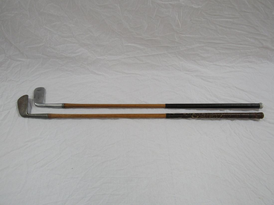 Lot of 2 Antique Lefty Wooden Golf Clubs: Lot of 2 Antique Left handed Wooden Golf Clubs. One Model One, the other an Ideal.