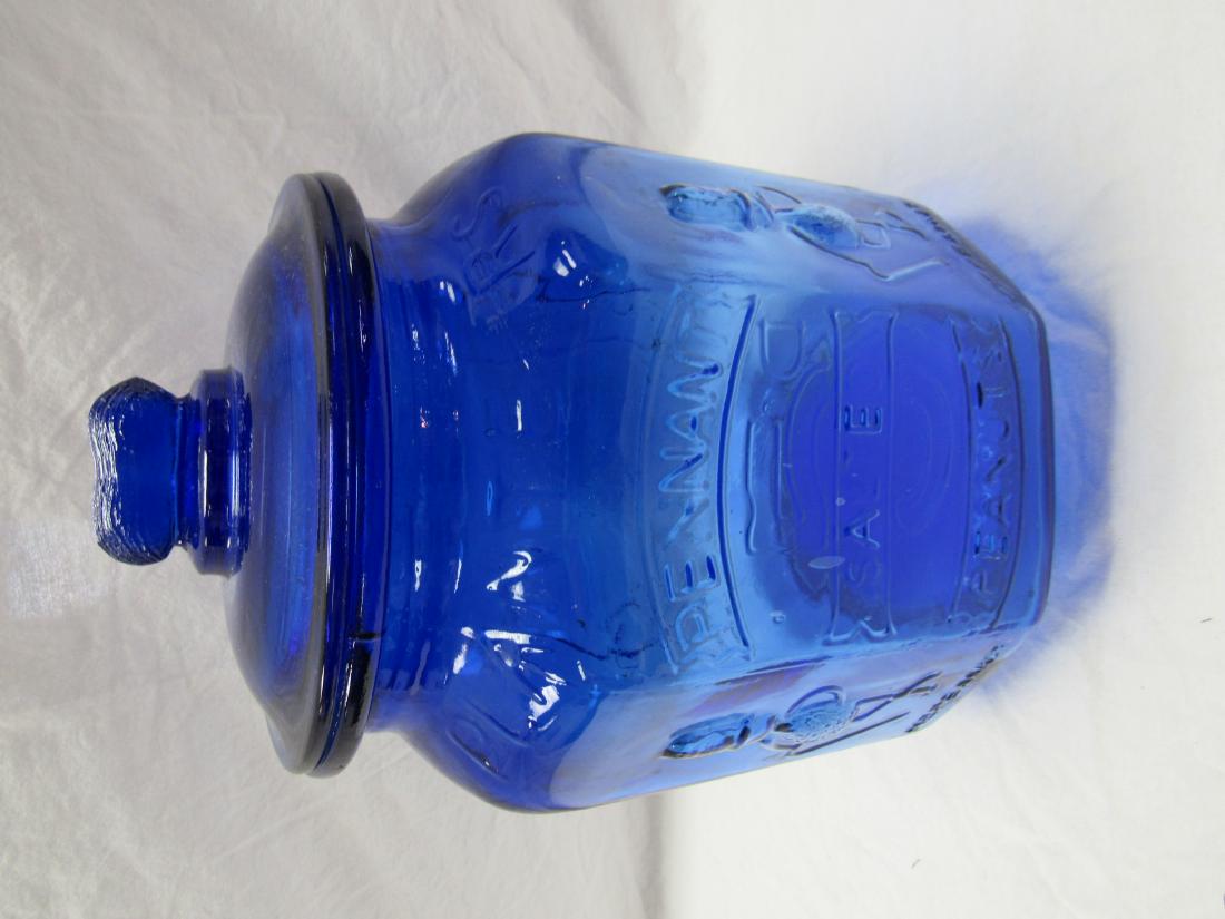 Planter's Peanuts Cobalt Advertising Jar: Planter's Peanuts Cobalt Advertising Jar. Jar depicts Mr. Peanut and reads "Pennant Peanuts Salted 5 cents". Excellent condition. No chips or cracks. 13" tall.