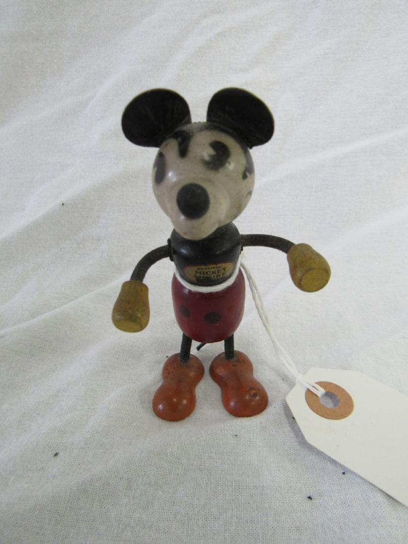 Antique Wooden Mickey Mouse: Antique Wooden Mickey Mouse. Constructed of wood with leather ears. Chest reads, Reg, US Pat Office Mickey Mouse. Overall very good condition. Measures 3.75" tall